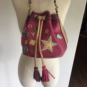 Dooney pink charm drawstring bucket bag